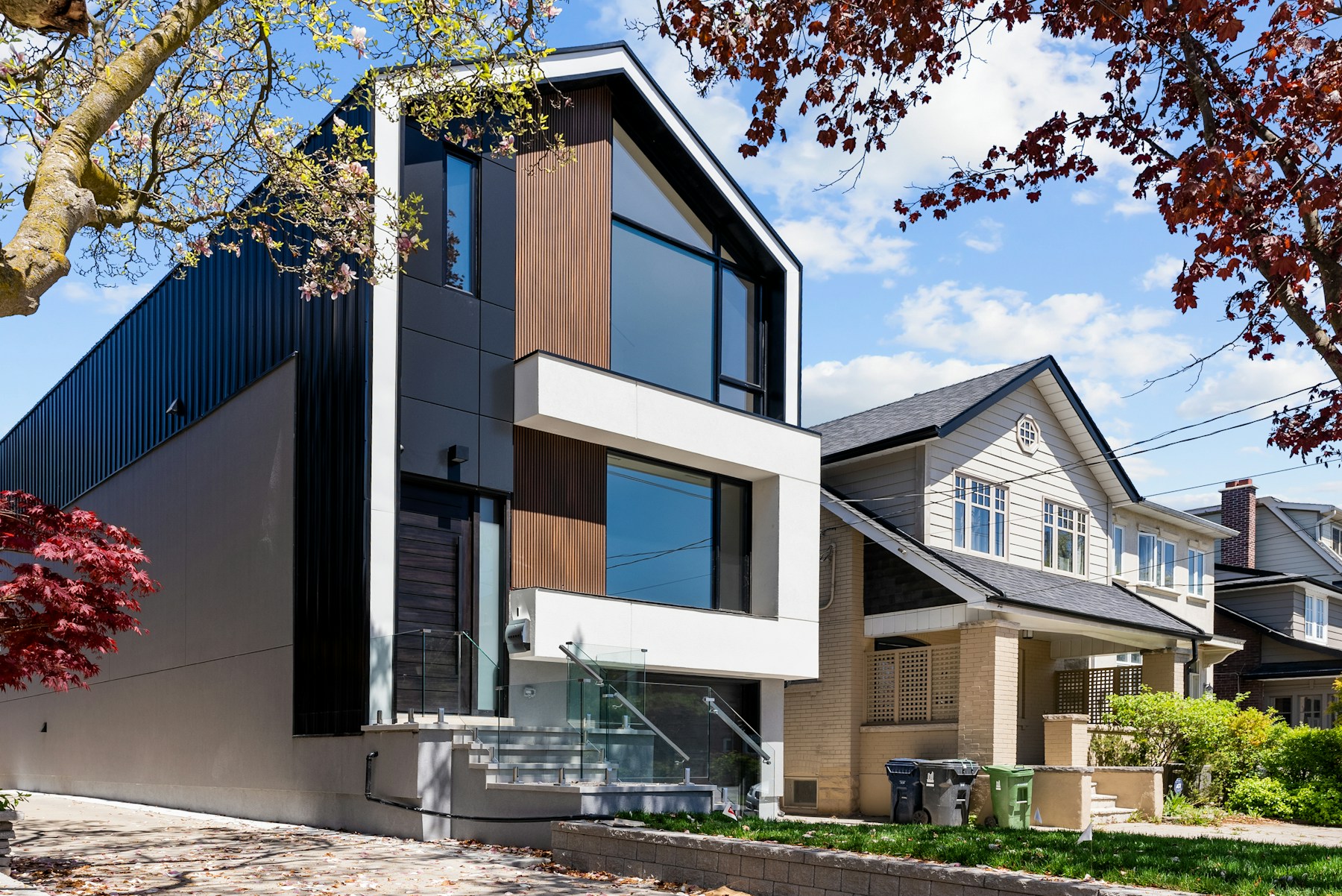 Contemporary residential home surrounded by trees